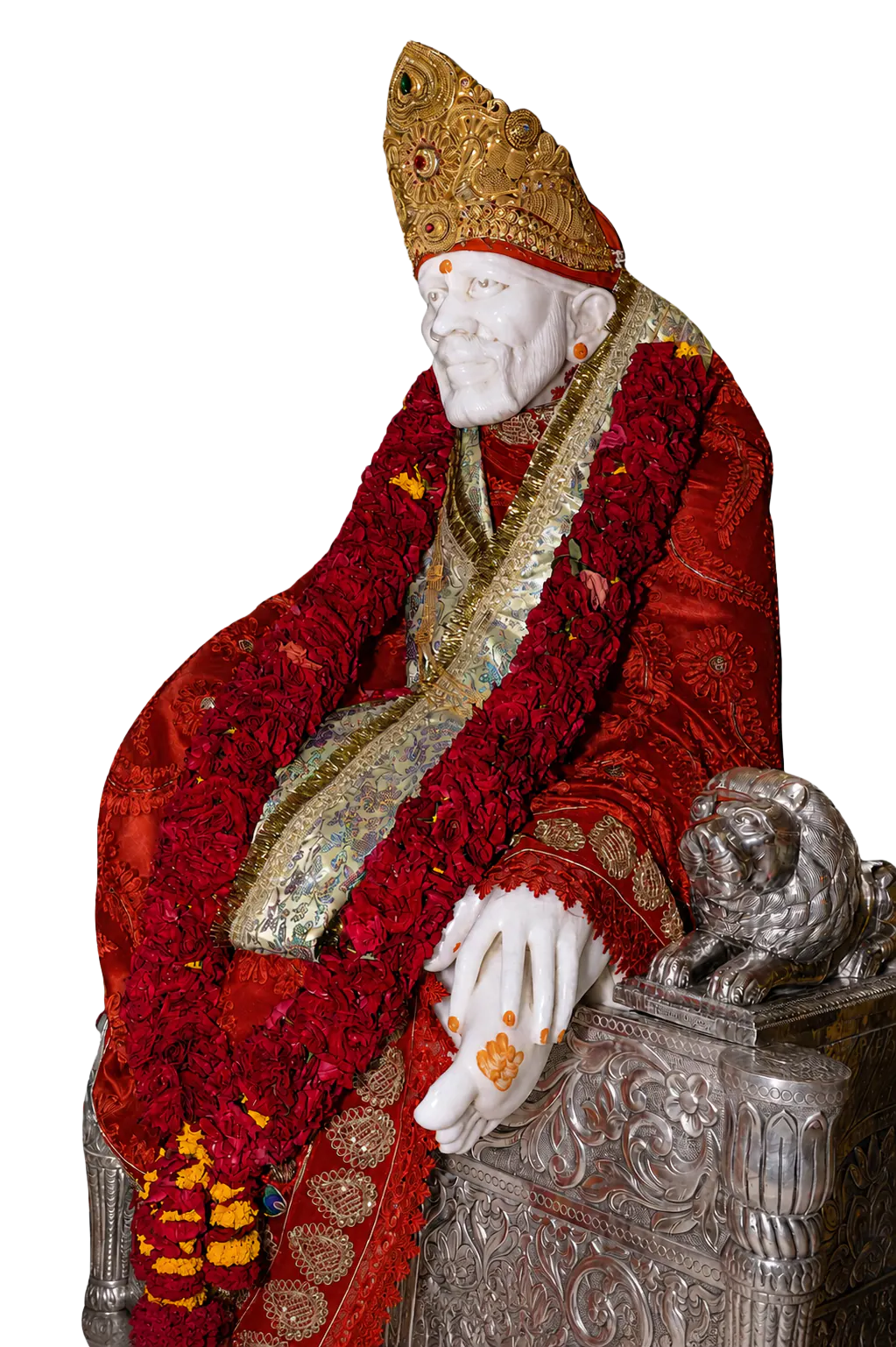 Shree Sai Baba idol seated with red garlands and a golden crown